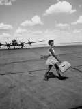 American Airline Hostess Crossing Field on Way to Jobs as a Model and Sales Clerk at Neiman Marcus