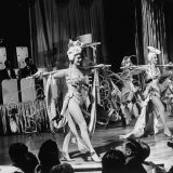 Night Club Dancers Performing a Scene on Stage