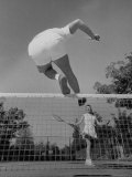 George Sutton Playing Tennis with His Wife