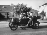 George Sutton and His Family Riding on a 1921 Model T Ford