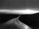 Ribbon of Road Leading Toward the Sunset