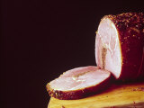 Sliced Ham Revealing It is Stuffed with Liver Pate