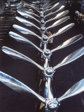 Worker Checking Row of Gleaming Airplane Propellers at Pratt and Whitney Aircraft Parts Factory