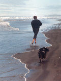 Presidential Candidate Bobby Kennedy and His Dog  Freckles  Running on Beach