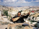 Turkish Man Playing a Type of Mandolin Called a Sis