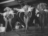 Three Moderately Naked Showgirls on Stage at the Lido Club