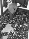 Sikh Removing His Shoes Before Entering the Shrine