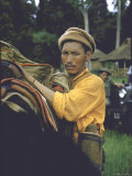 Tibetan Refugee at Misamari Camp with Guard in Background