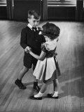 Young Boy and Girl Taking Dancing Lessons