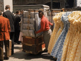 Racks of Dresses Steered by Pushboys in the Garment District