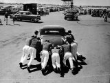 Men Pushing Car During Nat Hot Rod Assoc Drag Meet