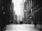 People and Horse Drawn Carts on Wall St  Where American Flags Fly from Buildings