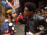 Yippie and Black Panther Confronting Each Other at the Riot Conspiracy Trial of the Chicago Eight