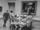 People Admiring Paintings at the National Gallery of Art