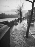 People Walking Through Dublin in the Rain