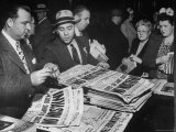 People Buying Newspapers Headlining the June 6  1944 D-Day Invasion of Nazi Occupied Europe