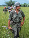 US Army Captain Robert Bacon Leading a Patrol During the Early Years of the Vietnam War