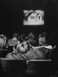 Teenage Couple Necking in a Movie Theater