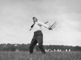 Vice Presidential Candidate Henry A Wallace  Throwing a Boomerang in a Field