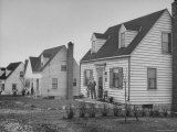Steel Worker Standing in Front of His House