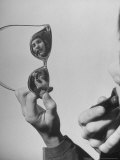 Model Lilly Fernandez Using Sunglasses as a Mirror