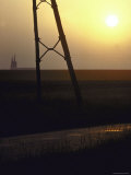 Sun Setting over Field and Distant Spires of Chartres Cathedral