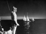 Sailing Instructor Jane Webb Waving Encouragement to Some of Her Students