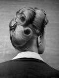 Woman Showing Her Fashionable Upsweeping Hairstyle