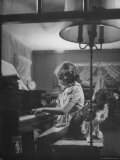 Suzy Creech  Typical Girl Known as a "Pigtailer" at Home Playing the Piano