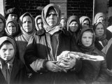Russian Woman Grimly Holding a Slab of Meat as Other Peasant Women Staunchly Stand By