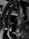 Two Russian Workers Manning Values at a Large Electric Power House