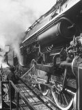Worker Cleaning Train Engine in Yard at Union Station