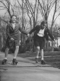 Typical 10 Year Old Girls Known as "Pigtailers" Roller Skating
