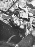 Statue Laying Among the Rubble of Bomb Destroyed State Opera House