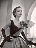 Woman Modeling a Short Ball Gown