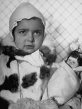 Young Rumanian Nina Viasopova  of Russian Extraction  Posing with Her Doll