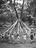 School Children Playing Around the May Pole