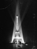 Spotlights Illuminating the Eiffel Tower at Night