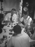 Men Playing Poker at Dining Room Table Covered with Chips  Cards  Ashtrays and Glasses