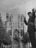 Policeman Directing Traffic in Front of the Reims Cathedral