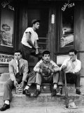 Teenage Boys Hangout on Stoop of Local Store Front