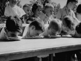 Pie Eating Contest During Church Social