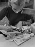 Woman Painting Her Fingernails