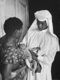 Sister Joseph Theresa Caring For Child Sick from Hunger