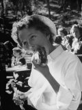Young Girl Eating a Hot Dog