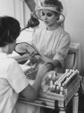 Model Getting a Manicure Prior to the "April in Paris" Charity Ball