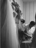 Women Pressing Clothing For the Adlai E Stevenson's New Years Party