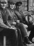Old Men Smiling  Sitting on Bench  After Waiting in Line For Meat