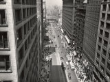 View Looking Down on Pedestrians Next to Bus and Streetcar Traffic on Bustling State Street