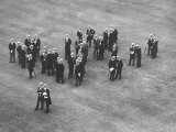 Top Hatted British Upper Class Ushers Standing in a Group at a Royal Garden Party
